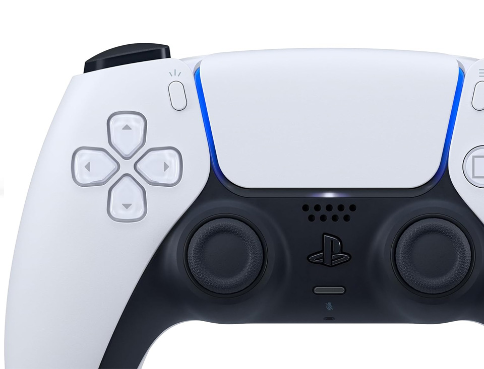 Front view of a PlayStation 5 DualSense wireless controller showing its two‑tone design with white outer shell and black central area, symmetrical thumbsticks, directional pad and PlayStation face buttons, a large touchpad at the top center, and subtle blue light accents near the touchpad edges.