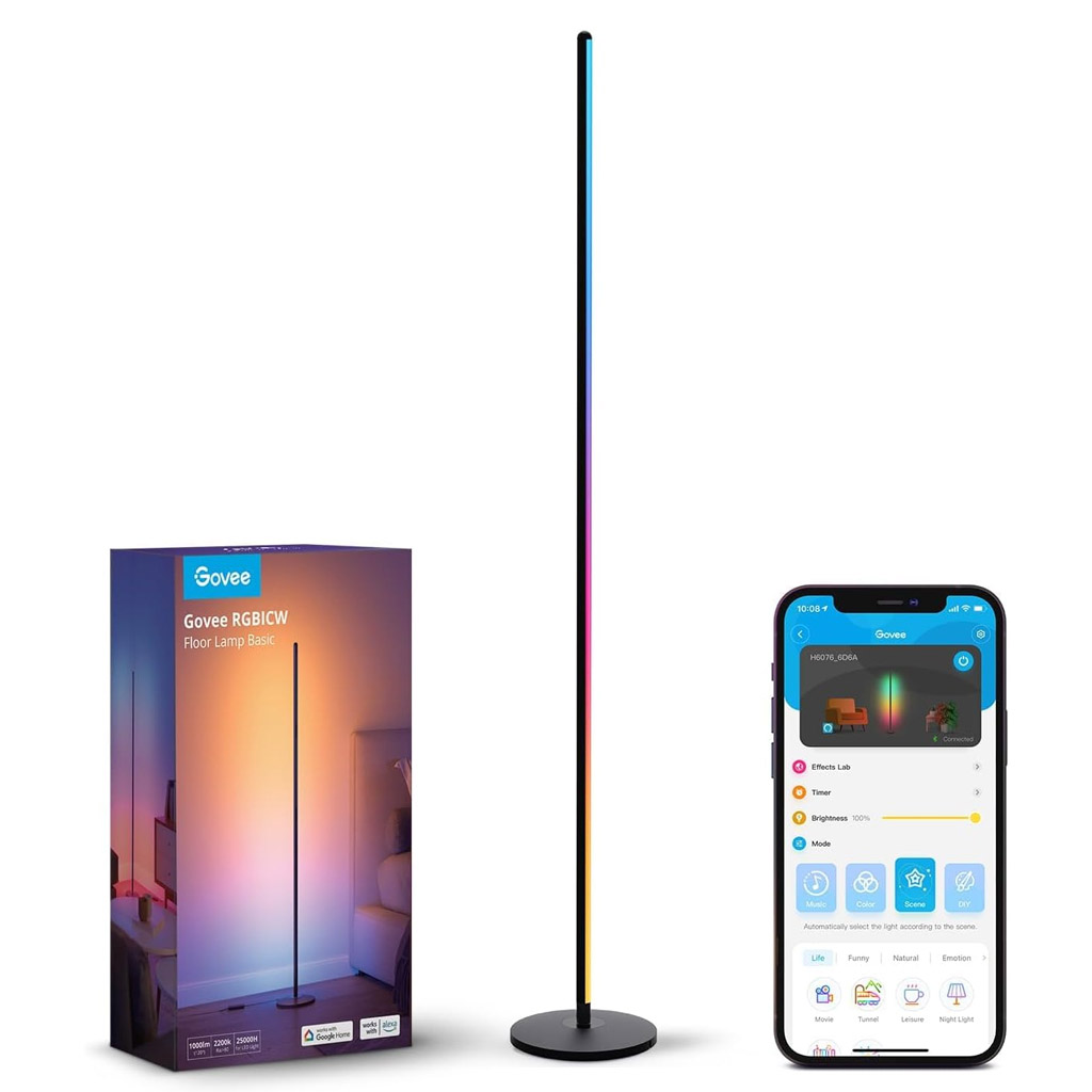 A tall, slim Govee RGBICW Floor Lamp emits multicoloured light from a circular base, positioned beside its packaging box which displays the lamp in a modern room setting. A smartphone screen shows the Govee app interface with options like Effects Lab, Timer, Brightness, and Mode, highlighting scene presets such as Life, Natural, Emotion, Leisure, and Night Light. The image showcases the lamp’s smart features, voice control compatibility with Alexa and Google Assistant, and its ambient lighting capabilities.