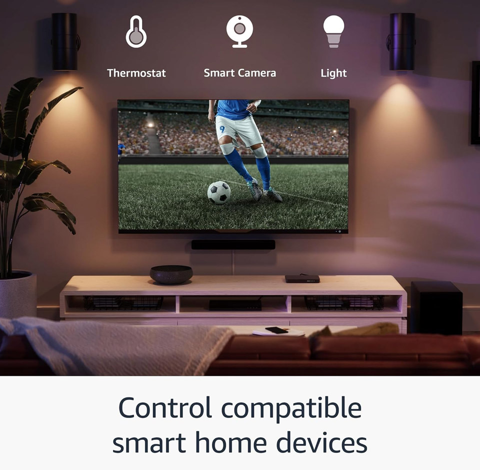 Wall-mounted TV controlling smart home devices, including thermostats, smart cameras, and smart lights, demonstrating smart home compatibility and voice control.