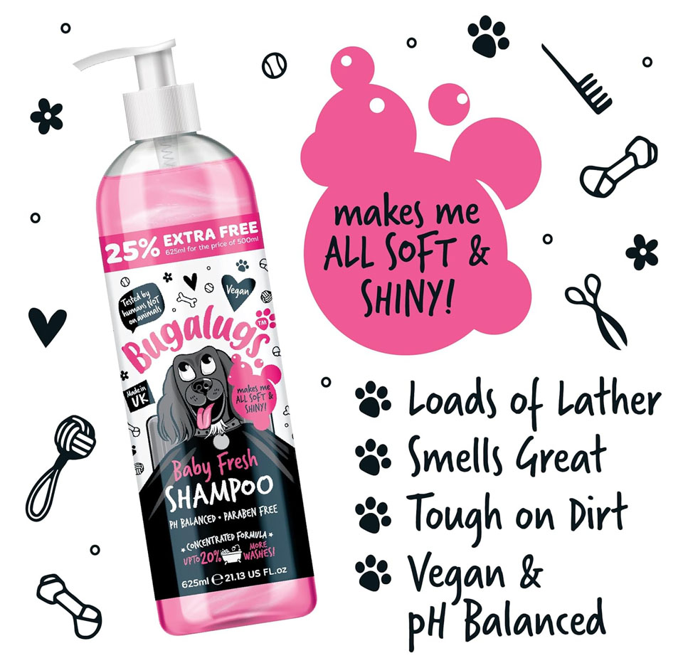 Bottle of Bugalugs Baby Fresh dog shampoo with pink liquid inside and a label featuring a cartoon dog and text. The label says “Baby Fresh Shampoo” and highlights pH balanced, paraben free and vegan. To the right are graphic icons and text reading “makes me all soft & shiny!” and bullet points with paw prints listing features like lots of lather, great smell, tough on dirt, vegan and pH balanced.