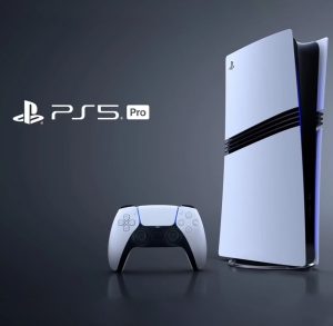 Front-facing view of a Sony PlayStation 5 Pro console standing upright beside a white and black DualSense controller on a dark surface, with the PS5 Pro logo displayed to the left on a grey background.